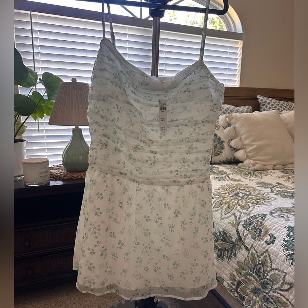 Hollister White Dress with built in shorts. with Sage Green Floral Print